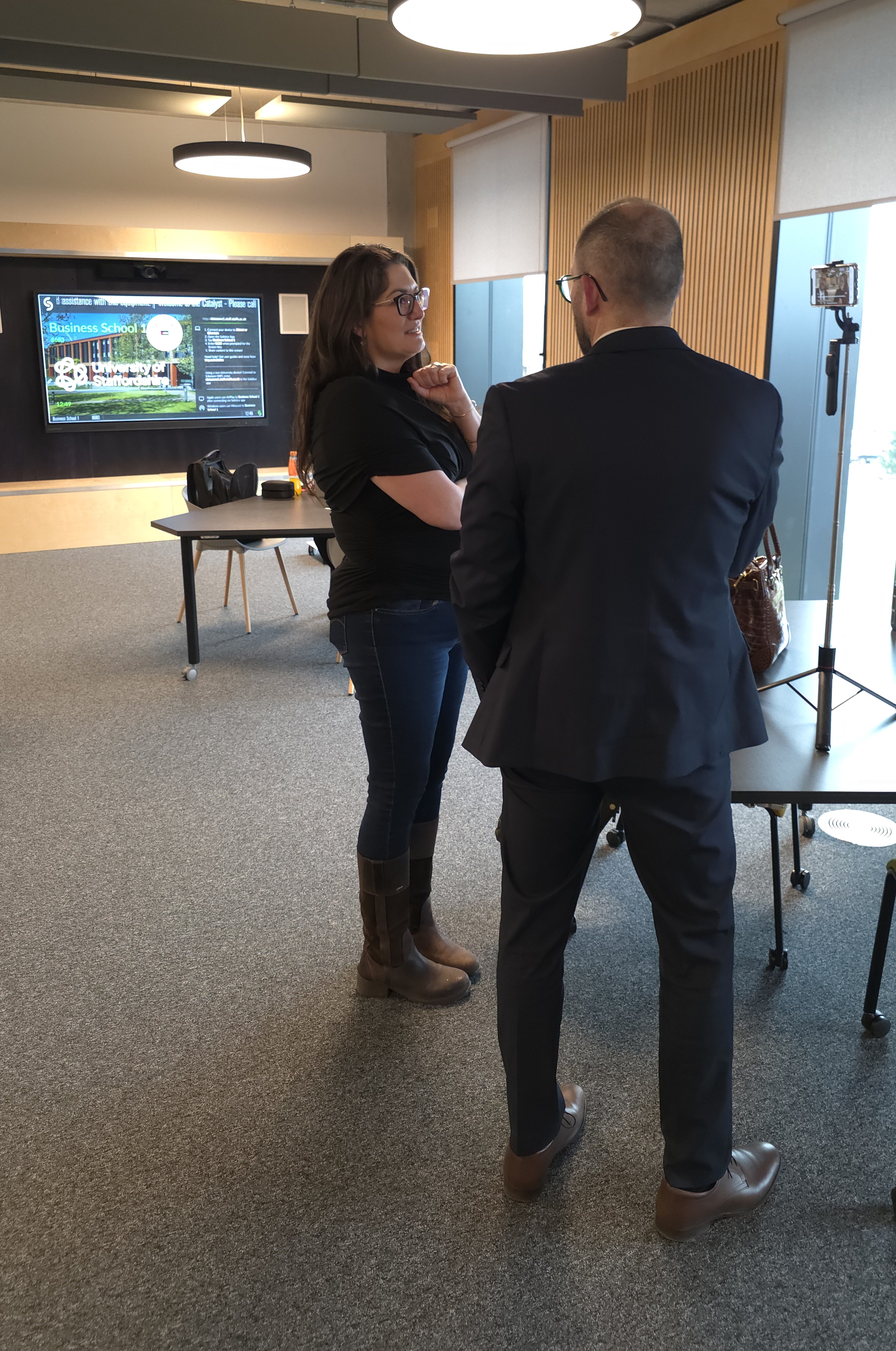 Speaker presenting to an audience or leading a workshop